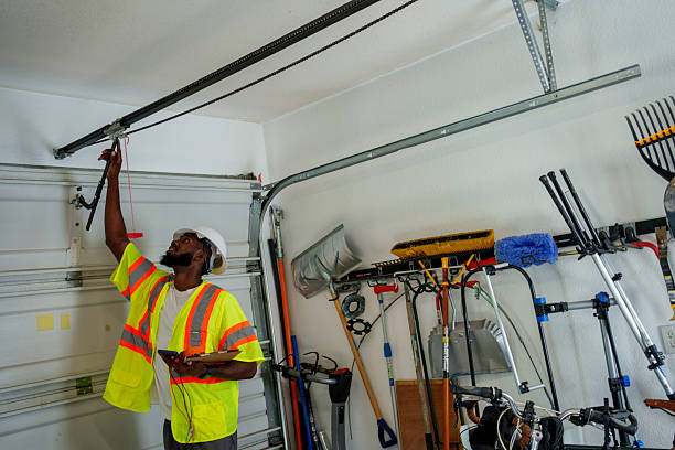 Professional Garage Door Installation technician working in Emory, TX